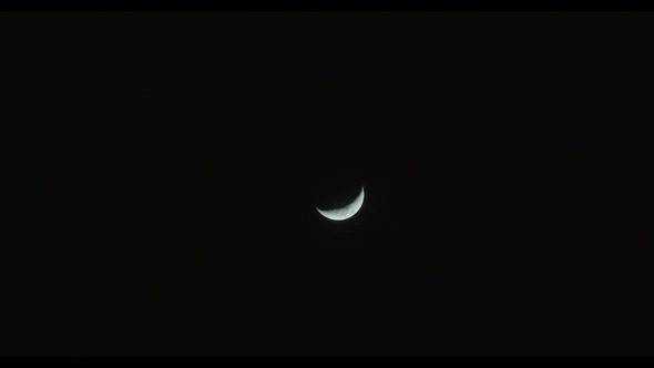 Crescent Moon In Night Sky