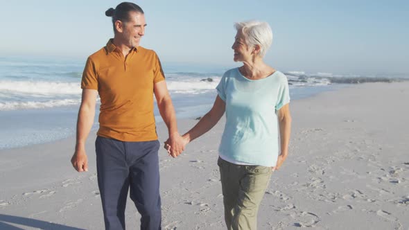 Senior Caucasian couple enjoying time at the beach