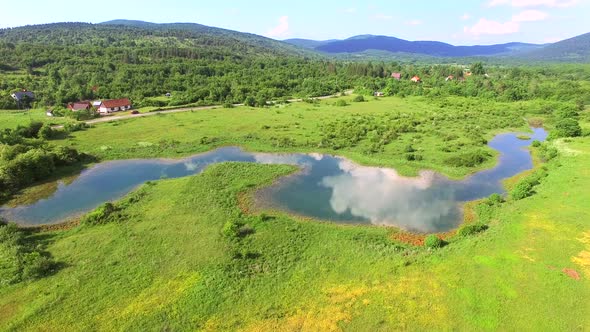 Aerial view of Jesenica river and surrounding in Croatian region Lika.