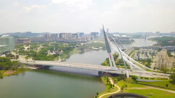 Seri Wawasan Bridge or Putra Bridge and Putrajaya Lake with blue sky