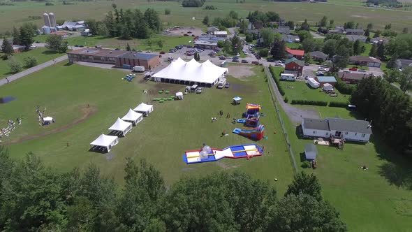 aerial zorb ball and other water game at fairgrounds 4k