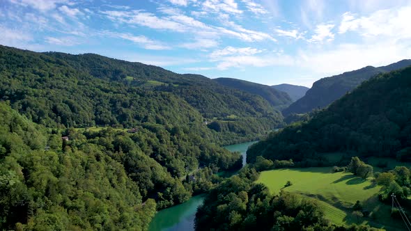 Stunning aerial footage of a river running between mountains