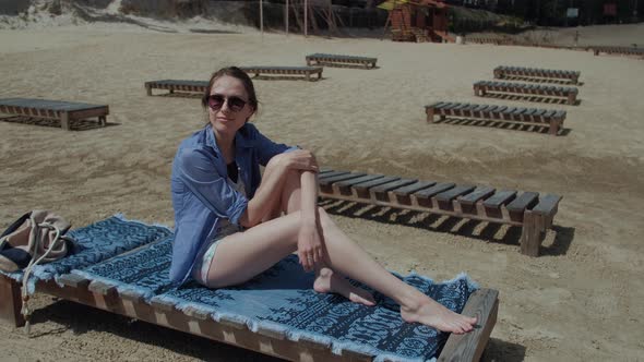 Beach Girl  Attractive Girl Sunbathing on a Beach