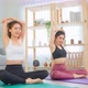 Asian active woman friend doing Yoga Pilates workout together at home. - VideoHive Item for Sale