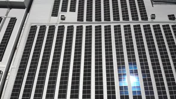 Aerial View of a Building with Solar Panels