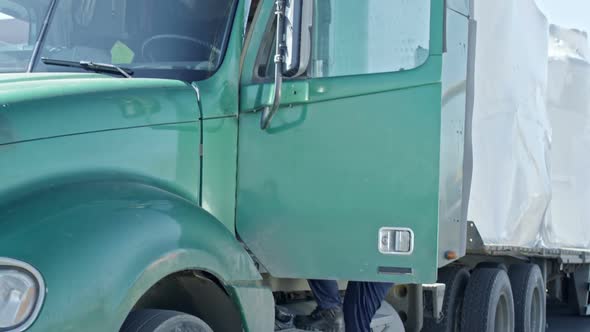 Black Female Driver Getting in Truck