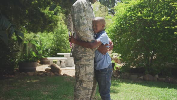 Father and son hugging each other