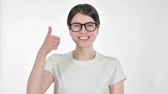 Young Woman Showing Thumbs Up on White Background