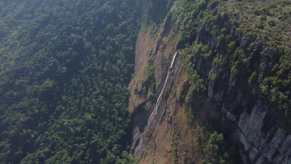 Drone shot of Mutarazi Falls in Zimbabwe - drone is descending, flying towards one of the waterfalls