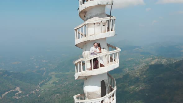 Couple on Balcony of Ambulawuwa Tower