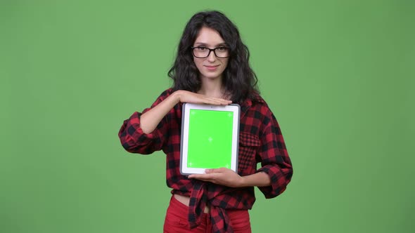 Young Beautiful Businesswoman Showing Digital Tablet