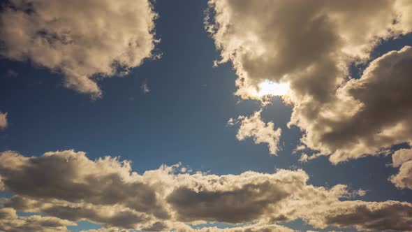 Beautiful view of passing clouds in sky on sunny day. Time lapse. Sweden.