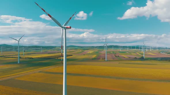 Aerial View of Wind Turbines Farm in Field. Austria. Drone View on Energy Production