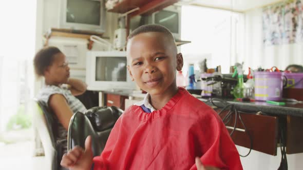 African boy happy after hair cut