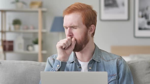 Coughing Beard Man Sitting in Creative Room