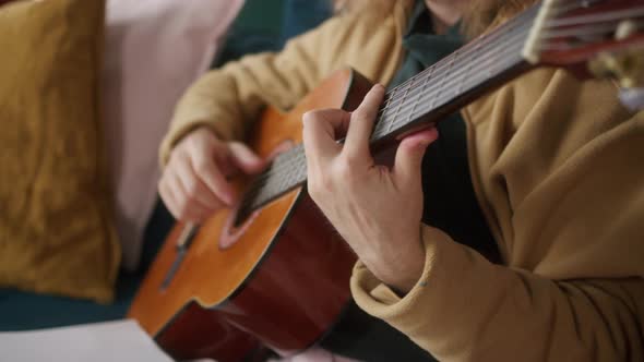 Man Playing Acoustic Guitar