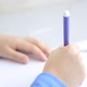 little boy at school drawing on paper stock video stock footage - VideoHive Item for Sale