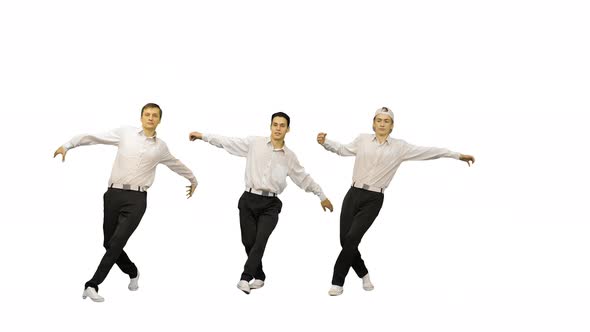 Three Guys in White Shirts Dancing in Synch Looking at Camera on White Background