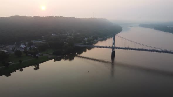 View of the Simon Kenton Memorial Bridge at Maysville, Kentucky on a foggy morning.  Aerial Drone fo