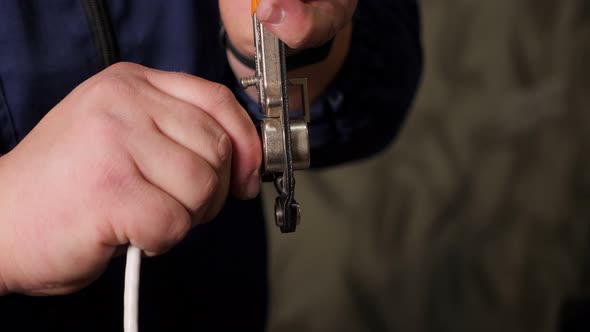 Stripping Wires and Removing Insulation From the Live Wire of the Internet Cable