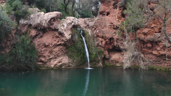 Pego do Inferno waterfall drone aerial view in Tavira Algarve, Portugal