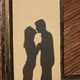 The Wall Reflects the Shadows of Lovers Kissing at Sunset - VideoHive Item for Sale