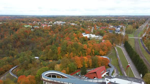 Autumn Landscape Aerial View of the Bobsleigh and Skeleton Track Luge Track Sigulda, Latvia. 4K Vide