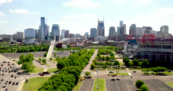 Nashville, Tennessee skyline with drone video moving up.