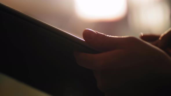 Women's Hands Hold the Tablet and Press the Screen