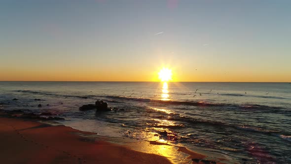 Sunset Over the Sea Aerial View 4 K