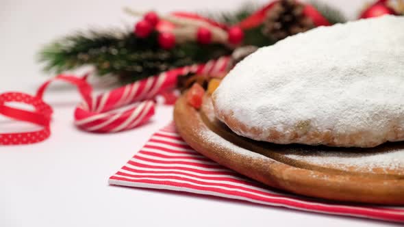Traditional Christmas Stollen Cake with Marzipan and Dried with New Year Decorations