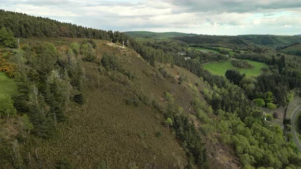 Rural mountain land ending near monumental Cross