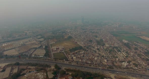 Bombay, India, aerial pan shot of the city, huge view of city, drone view, a highway of city with tr