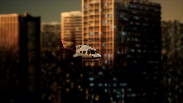 Slow Motion Helicopter Near Skyscrapers at Night alt
