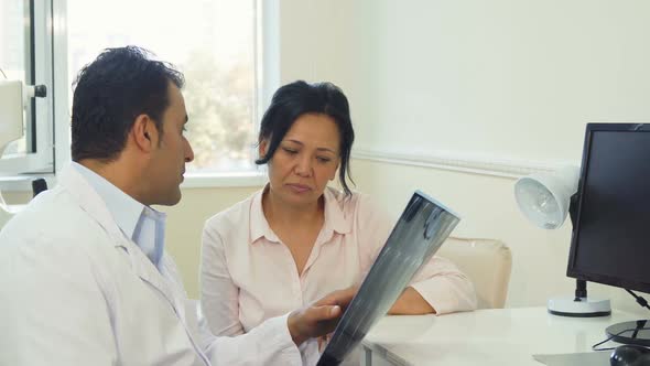 Attentive Patient Listens To Doctor's Advice