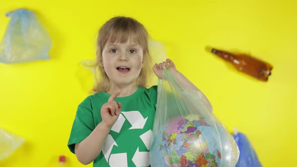 Girl Activist with Earth Globe in Plastic Package. Reduce Trash Pollution. Save Ecology Environment