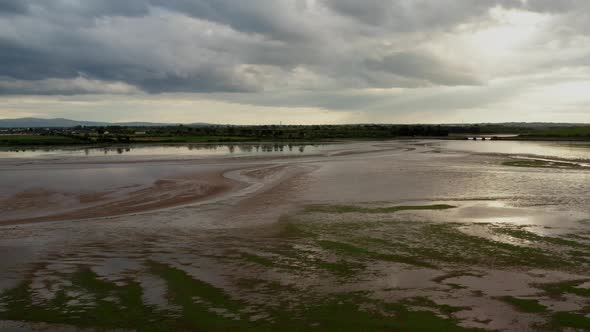 Estuary at sunset, aerial view.