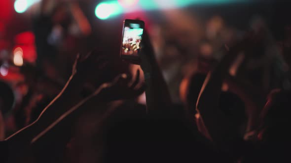Footage of a Crowd Partying at a Rock Concert or Dj Party Slow Motion Shot