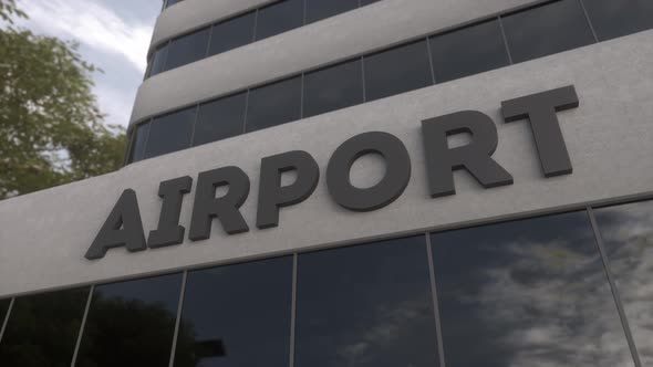 Airport Sign on a Modern Skyscraper