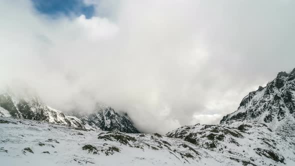 Clouds in Winter Mountains