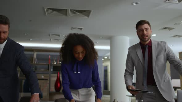 Multiracial Business Team Finishing Work Conference Meeting in Office Workplace