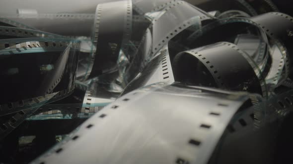 Scrolls of an Old Black and White Shabby Film Tape Depicting