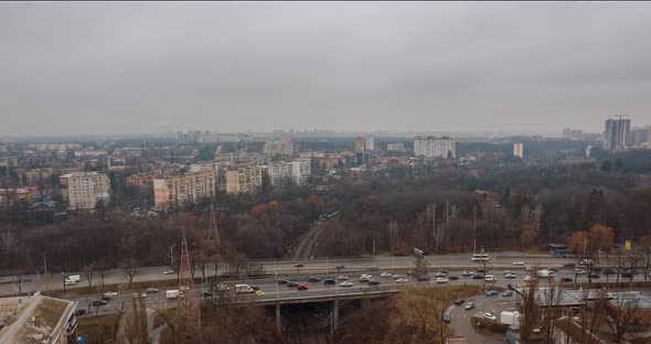 Rooted City Life. the Crazy Traffic of Cars on the Bridge and the Railway. 