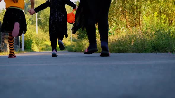 Children in Costumes are Celebrating Halloween