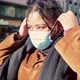 Young woman putting face mask on street, Italy - VideoHive Item for Sale