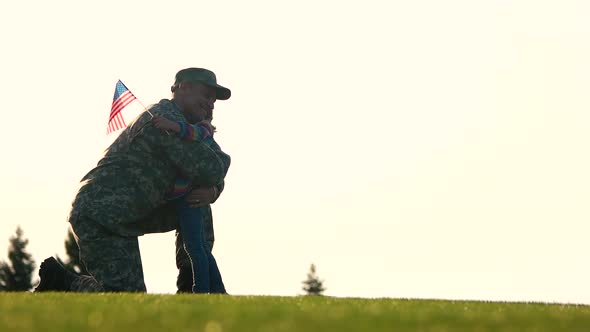 American Soldier Hug with His Little Daughter