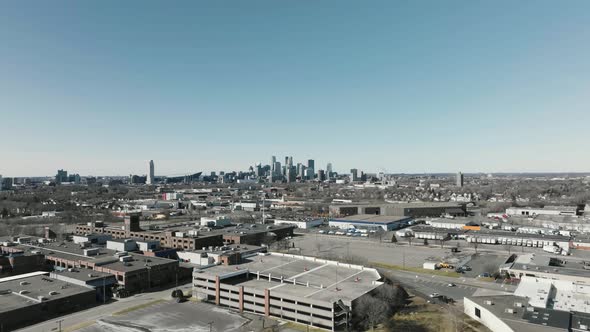 push in aerial drone shot of the downtown Minneapolis skyline, in the Twin Cities of Minnesota