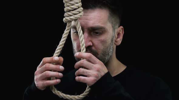Desperate Man Wearing Loop on Neck, Suicide Prevention Concept, Risk of Death