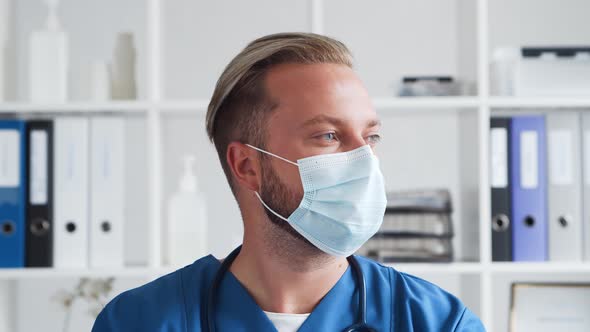 Professional medical doctor in hospital office, Portrait of young and confident physician.