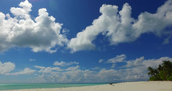 Beautiful overhead travel shot of a sunshine white sandy paradise beach and aqua turquoise water bac